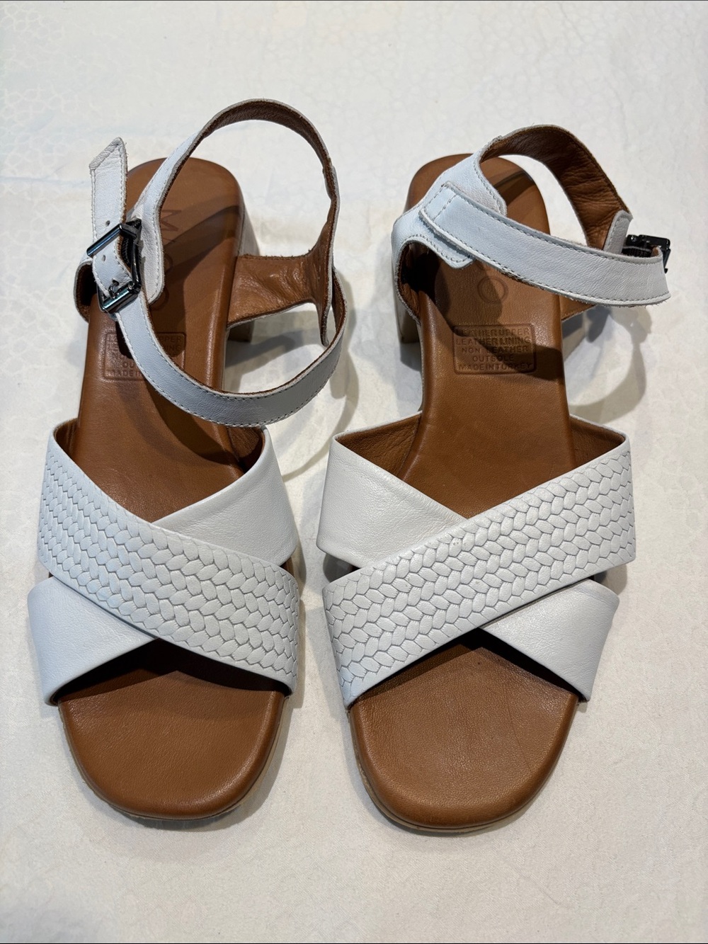 Mago women’s White Leather Cross-Strap Sandals with Ankle Buckle